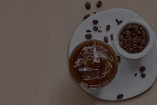 coffee with beans next to it